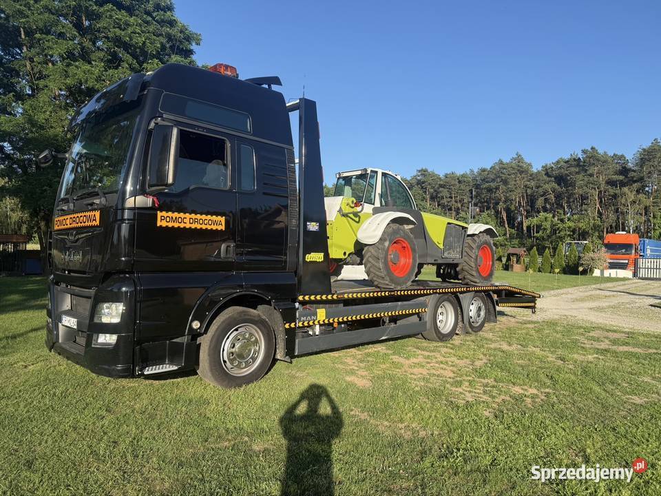 Transport maszyn budowlanych i rolniczych Klonowa