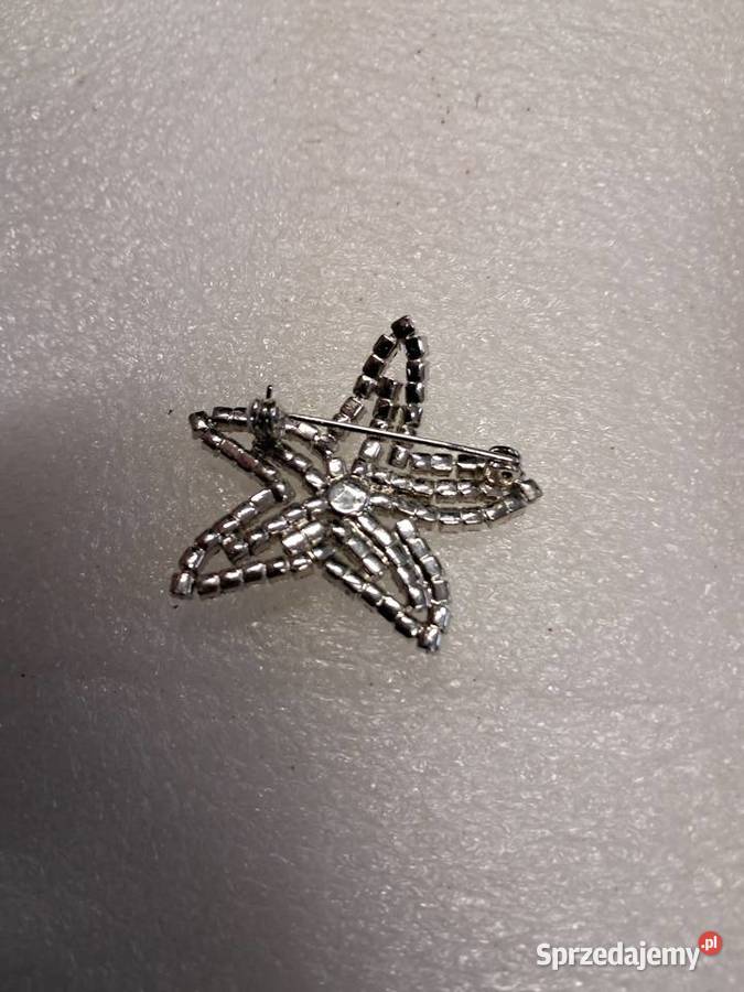 broszka z prlu z cyrkonii stan średnica 5 sprzedam