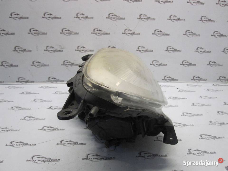 OPEL CORSA D lampa prawa przód 13432892 90003113