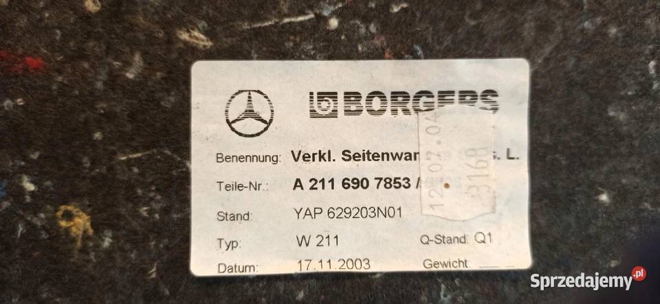 MERCEDES W211 BOCZEK BAGAŻNIKA LEWY A2116907853