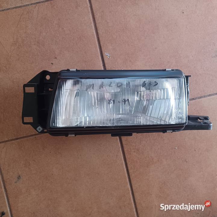 LAMPA MAZDA 323 S IV 8996 lewa Pozostałe wielkopolskie Rakoniewice