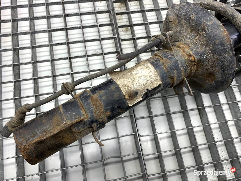 AMORTYZATOR LEWY PRZÓD ZE SPRĘŻYNĄ AUDI A3 8L 18 osobowe