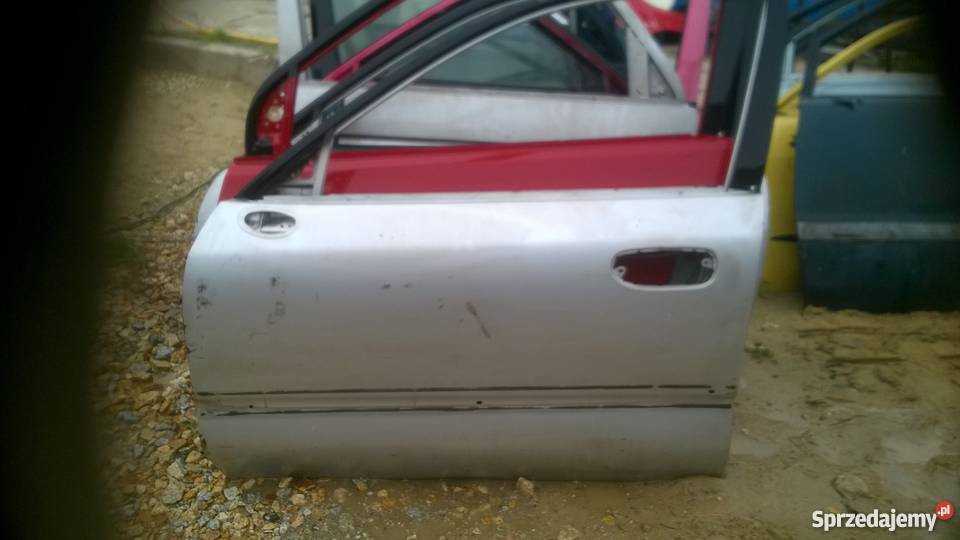 MITSUBISHI CARISMA 1996 2001 DRZWI LEWE PRAWE Wrocław