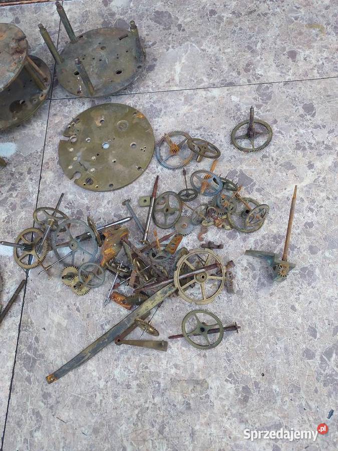 Zestaw części elementy mechanizmu starego zegara Tczew