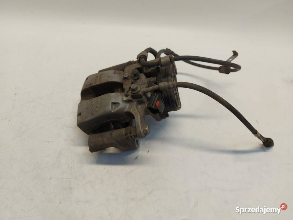 TESLA MODEL Y 2024r ZACISK HAMULCOWY LEWY TYŁ osobowe dolnośląskie sprzedam