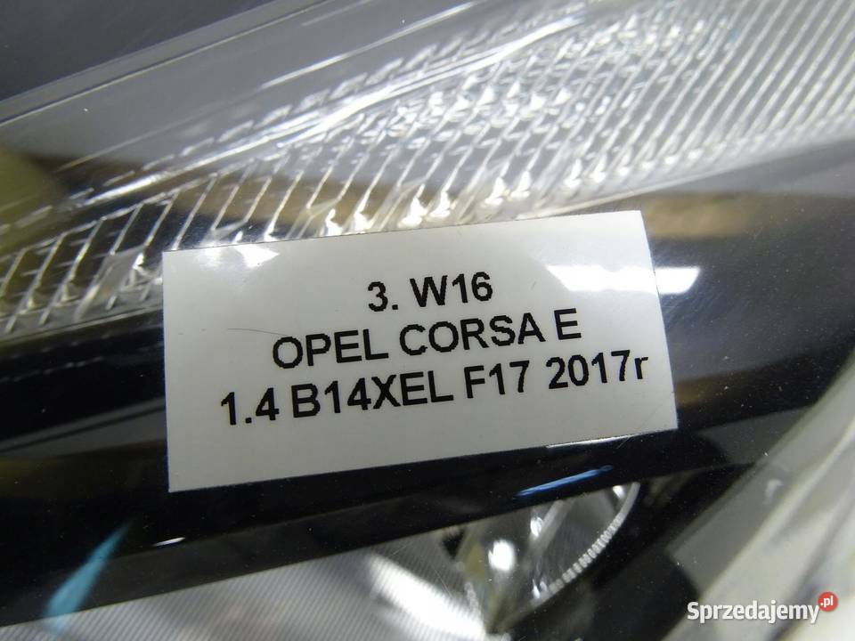 LAMPA REFLEKTOR LEWY PRZÓD PRZEDNIA OPEL CORSA E