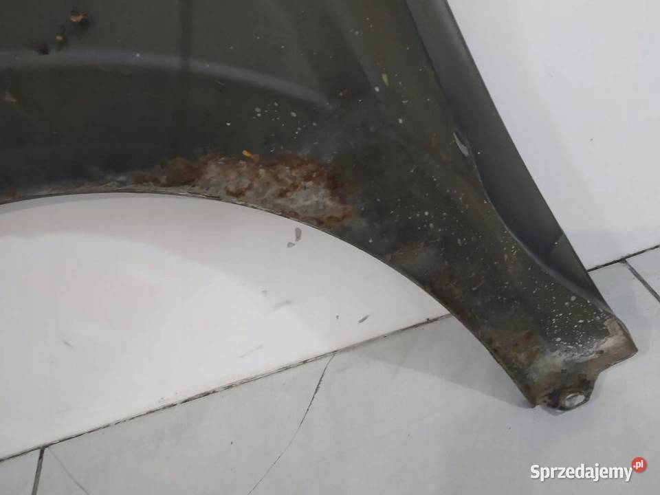 BŁOTNIK PRAWY PRZÓD CZARNY Opel Astra III