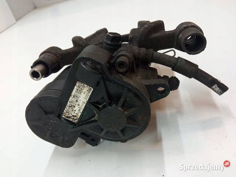 ZACISK HAMULCOWY LEWY TYŁ 20 TDCI DG9G2D251H Zaciski i jarzma