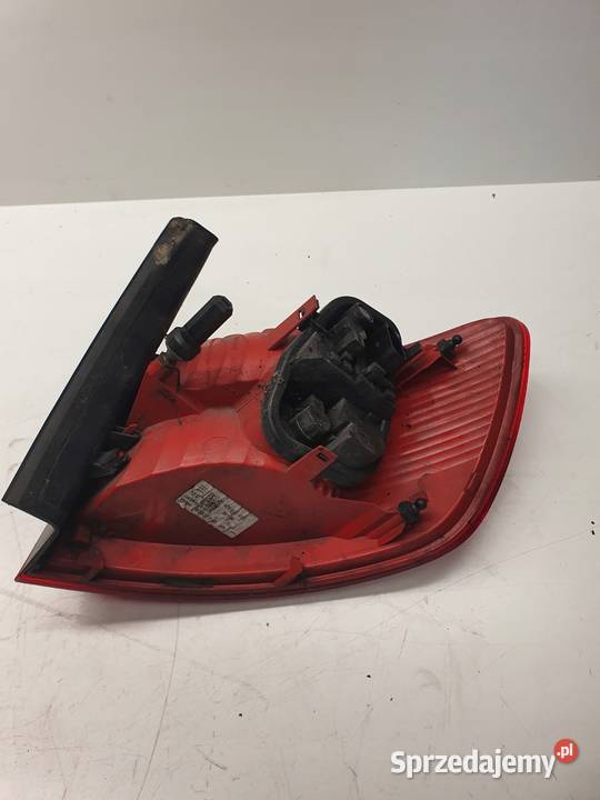 LAMPA LEWY TYŁ W BŁOTNIK AUDI A6 C6 4F9945095 Przystajń