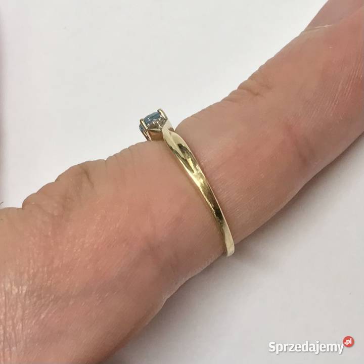 Złoty pierścionek 9K 375 z błękitnym topazem i złoto Warszawa