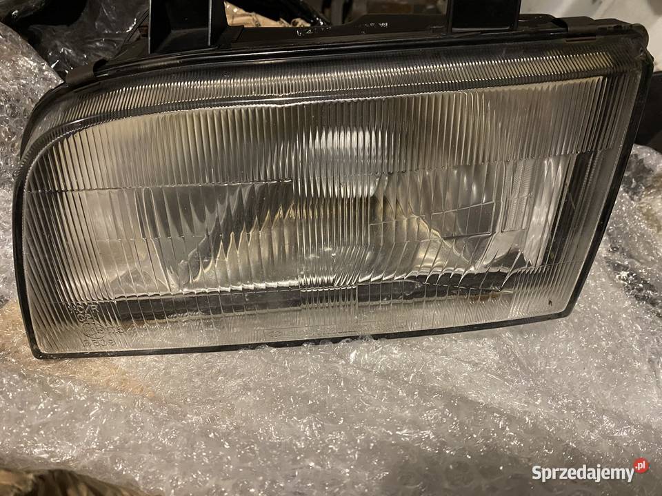 Reflektor Lampa Kia Sportage I szklany