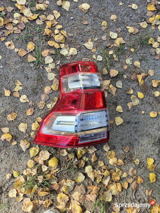 LAMPA TYLNA TOYOTA LAND CRUISER LEWA ORYGINAŁ terenowe Pionki