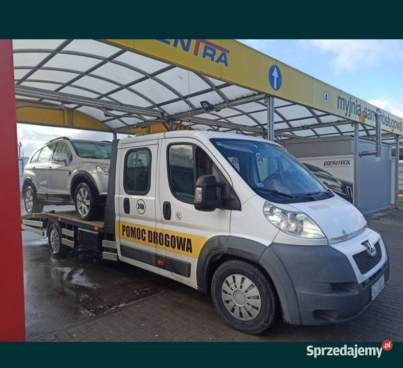 Pomoc drogowa holowanie transport laweta Giżycko warmińsko-mazurskie usługa