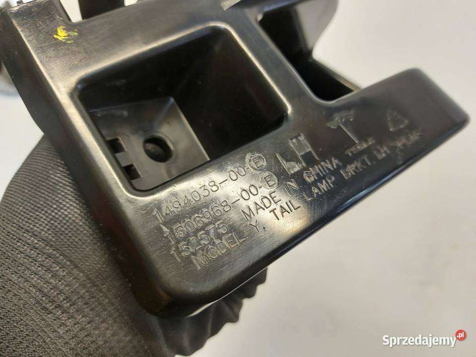 TESLA MODEL Y 2024r ŚLIZG WSPORNIK LAMPY LEWY osobowe