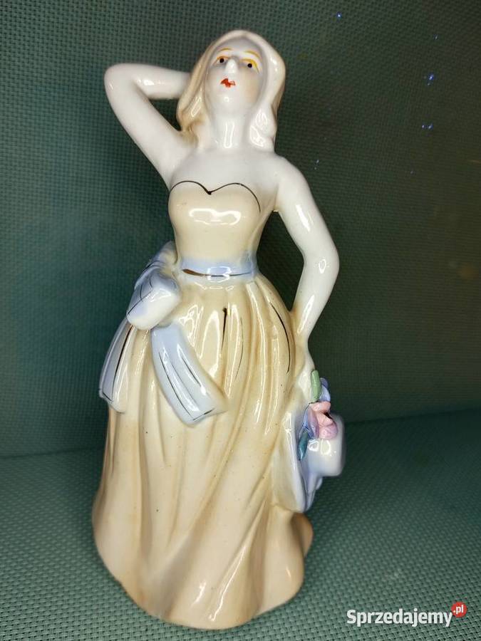 Porcelanowa figurka eleganckiej damy z Warszawa