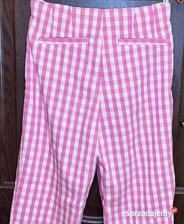 Spodnie damskie w różowobiałą kratkę Spodnie sprzedam