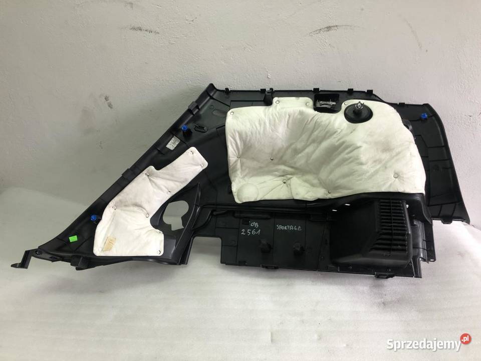 BOCZEK BAGAŻNIKA 857303U000 LEWY KIA SPORTAGE