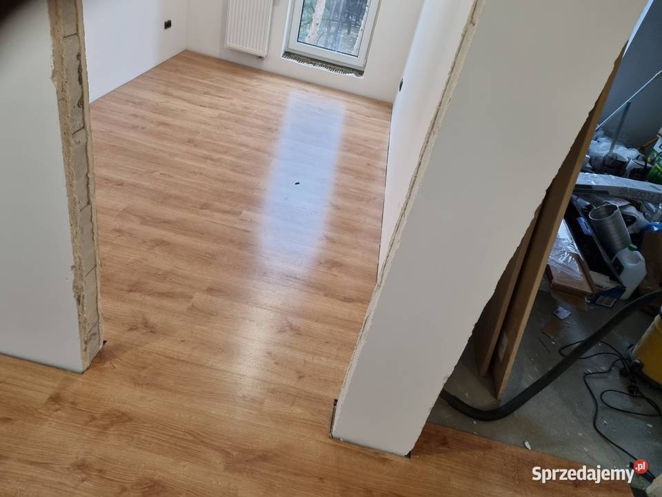 Układanie płytek lamelipaneli wykończenia wnętrz Kraków