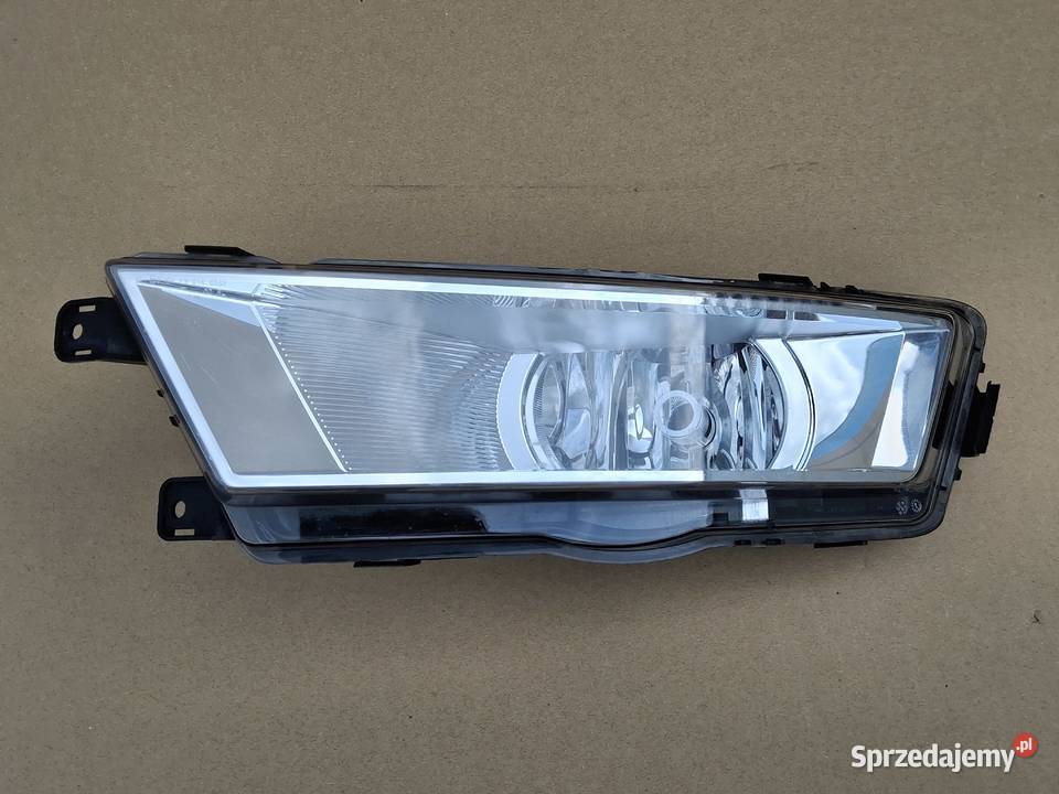 SKODA RAPID HALOGEN LEWY LAMPA PRZECIWMGIELNA Części samochodowe Bieleń