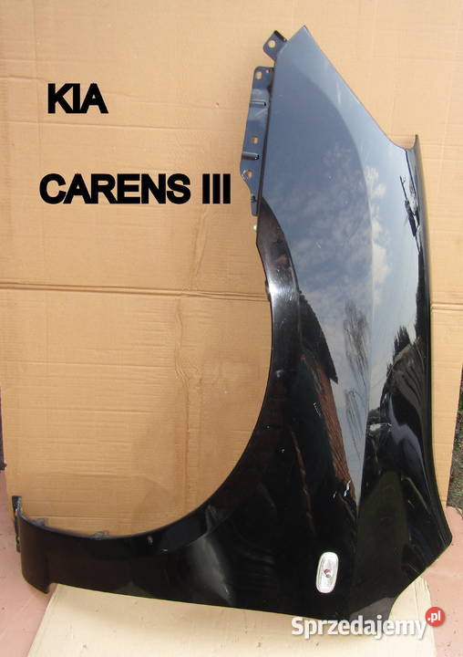 BŁOTNIK PRZEDNI LEWY KIA CARENS III 2007r CZARNY Mysłaków
