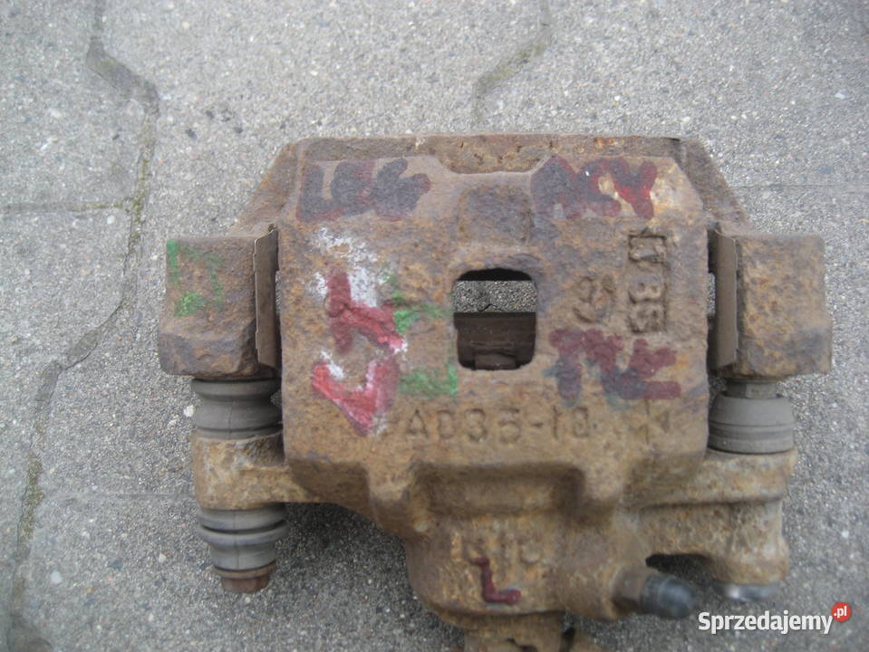subaru legacy 9194R 20B zacisk hamulcowy tył osobowe Rakoniewice sprzedam
