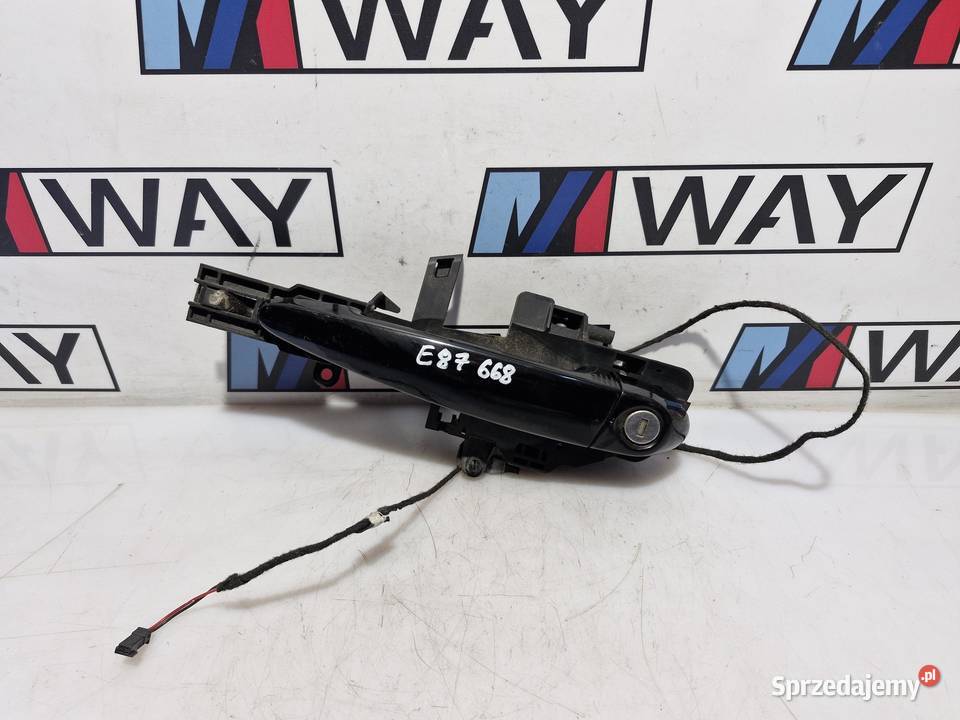 7154065 BMW E87 KLAMKA LEWA PRZEDNIA WKŁADKA 668
