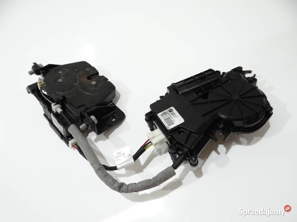 ZAMEK TYLNEJ KLAPY BAGAŻNIKA DOCIĄG BMW F11 Strzyżewice