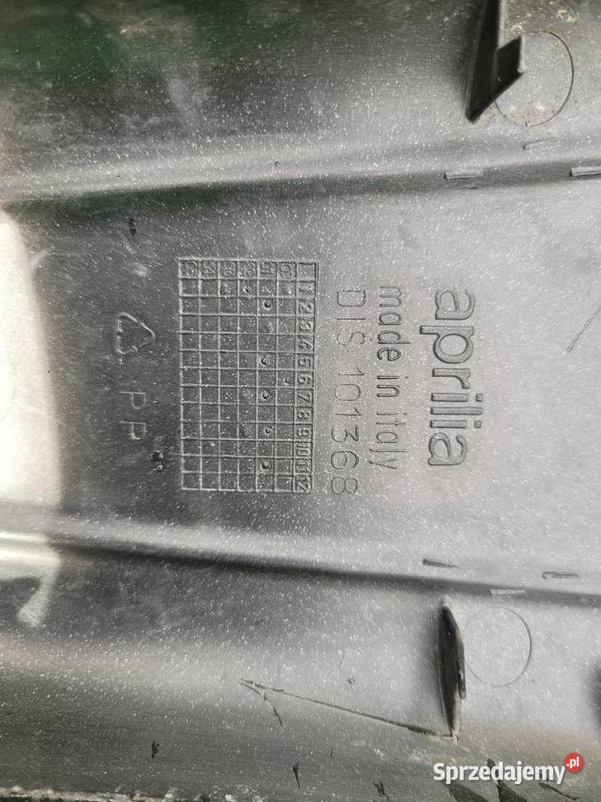 APRILIA SR oslona akumulatora zaslepka plastik Piła
