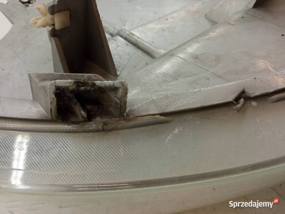 LAMPA PRZÓD LEWA EU 91165719 Renault Trafic II osobowe Lampy przednie