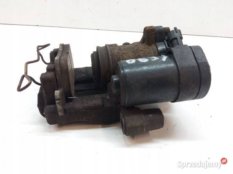 ZACISK HAMULCOWY PRAWY TYŁ 20 TDCI DG9C2D250H Rok produkcji 2015