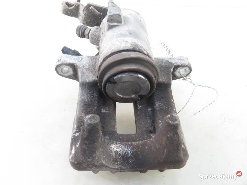 ZACISK LEWY TYŁ VW GOLF V 1K1 16 FSI BAG