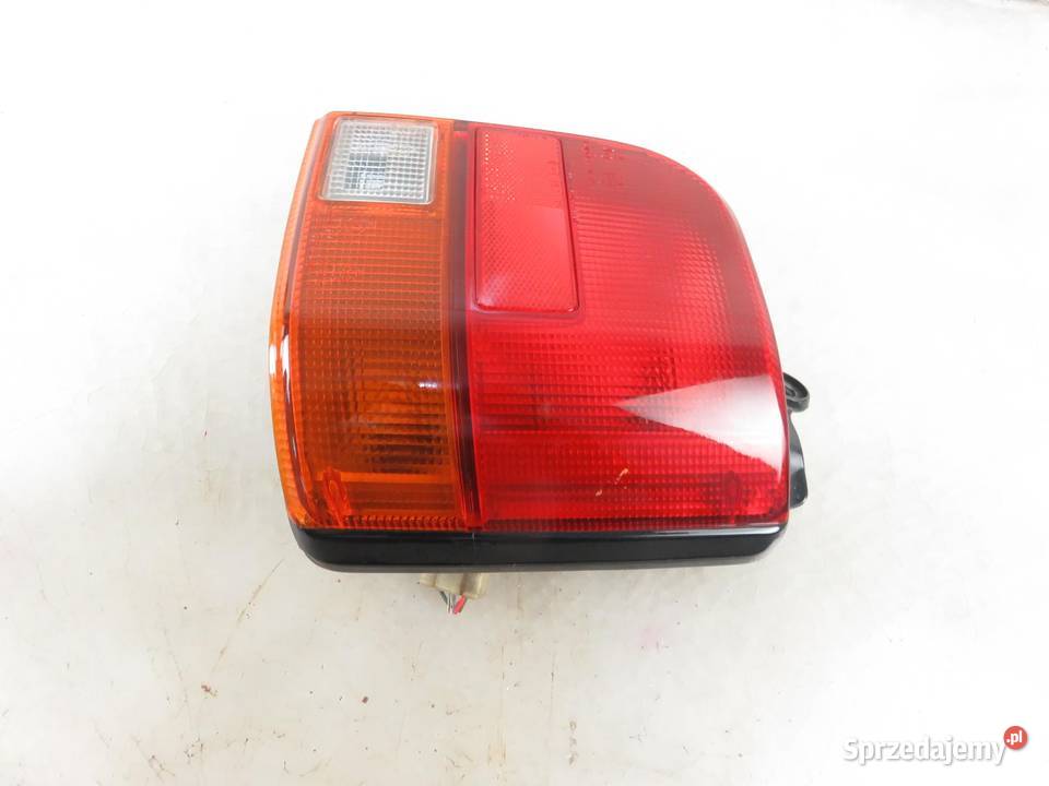 LAMPA PRAWA TYLNA DAIHATSU CUORE III 22051289 osobowe Motoryzacja