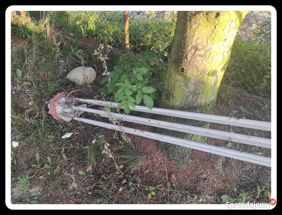 Wysoki metalowy ciężki kwietnik na wiszące biały sprzedam