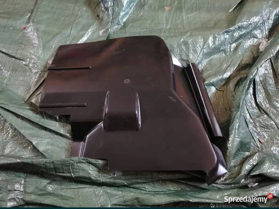 Osłona maskownica lampy lewy przód BMW E34