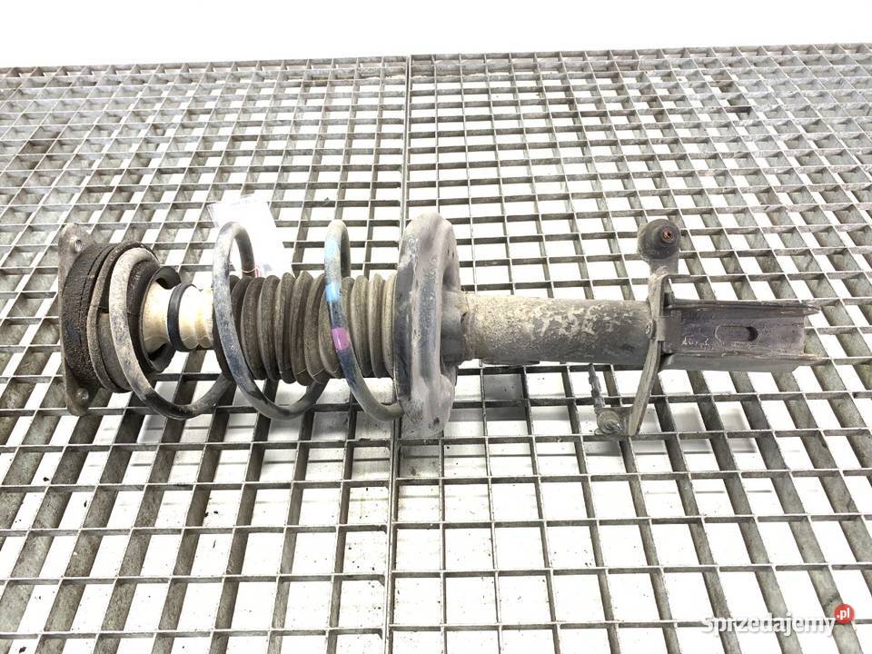 AMORTYZATOR LEWY PRZÓD ZE SPRĘŻYNĄ RENAULT podkarpackie