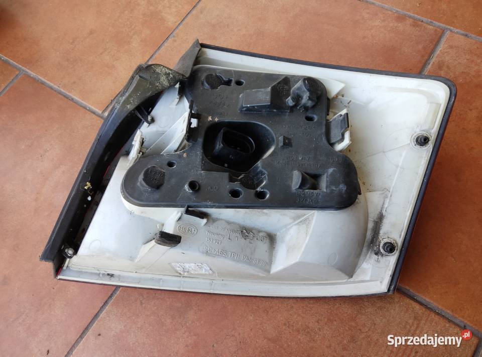 Lampa lewa tył audi a4 b6 hella sedan