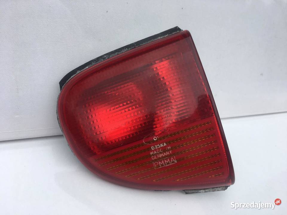 FORD ESCORT PRAWA LAMPA W KLAPĘ Ostroróg