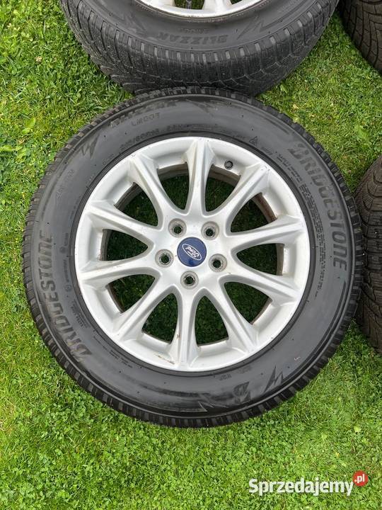 Felgi Ford OE 16 opony zimowe Bridgestone aluminiowe Gnieżdżewo