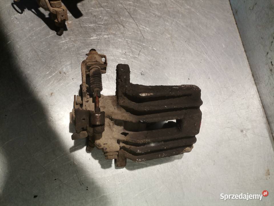 ZACISKI ZACISK LEWY TYŁ VW POLO IV 9N Rok produkcji 2004