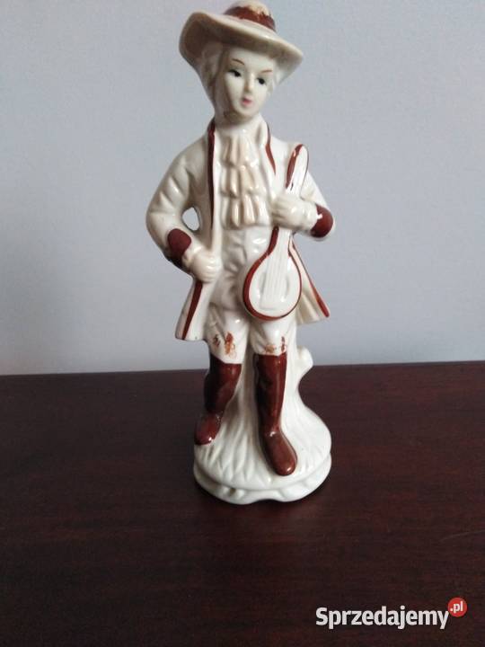 Porcelanowa figurka muzyk skrzypek antyk