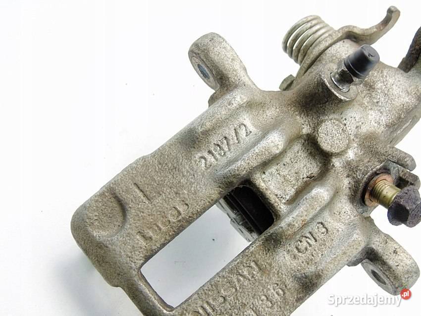 ZACISK HAMULCOWY LEWY TYŁ NISSAN ALMERA TINO
