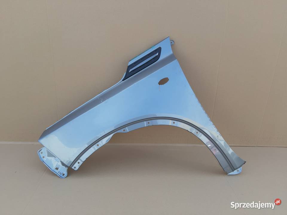 SUZUKI VITARA III BŁOTNIK LEWY PRZÓD Trzciel