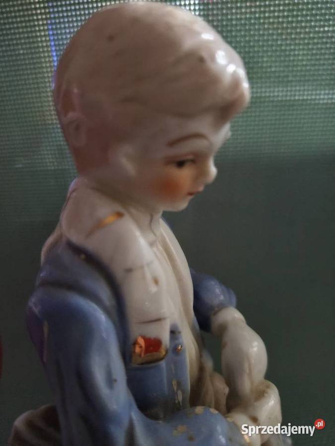 Porcelanowa figurka chłopca drwala leśniczego