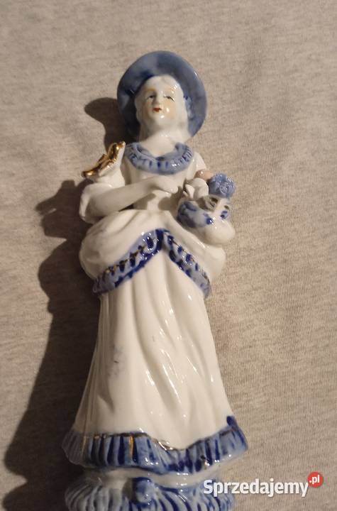 Porcelanowa figurka dziewczyna z bukietem i Koźminek