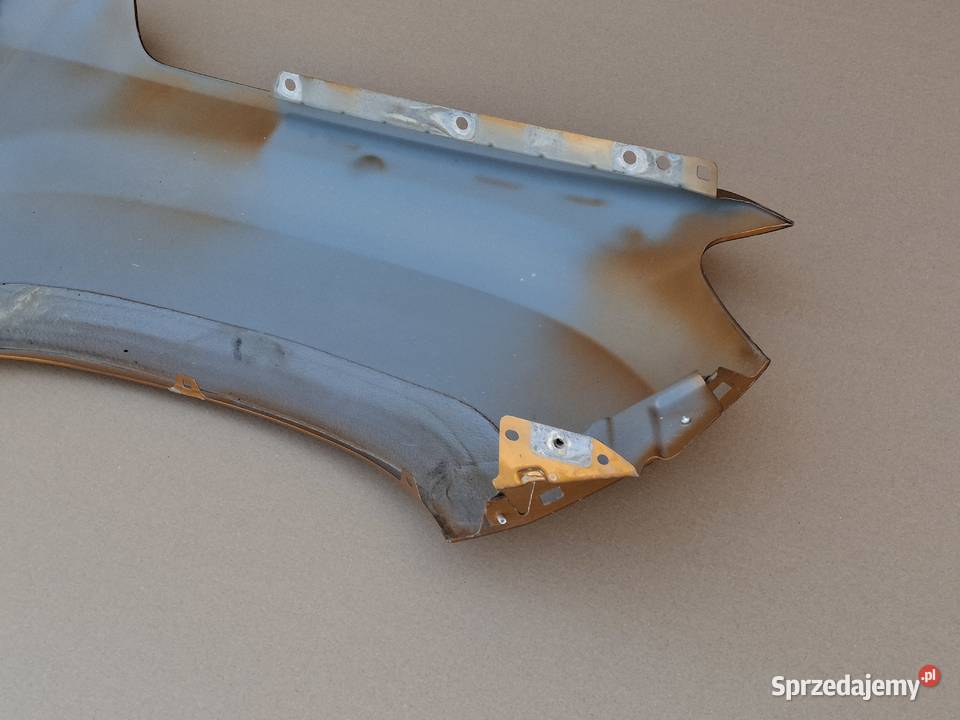 DACIA DUSTER II 2 BŁOTNIK LEWY PRZÓD 631011252R Bieleń