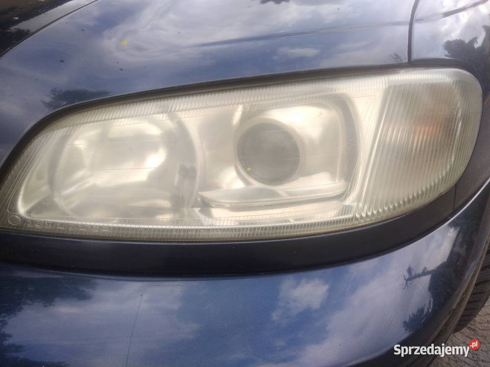 Reflektor Hella Opel Omega B FL lewy przód Sochaczew