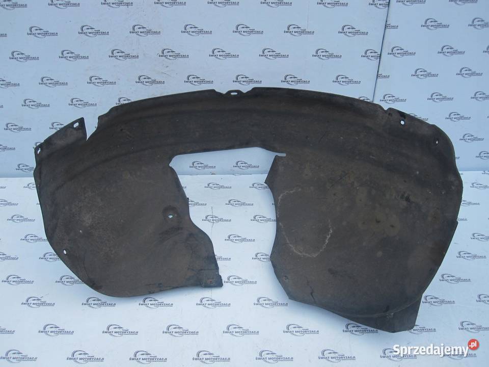 VW GOLF V 04r nadkole lewe przód 1K0805977B