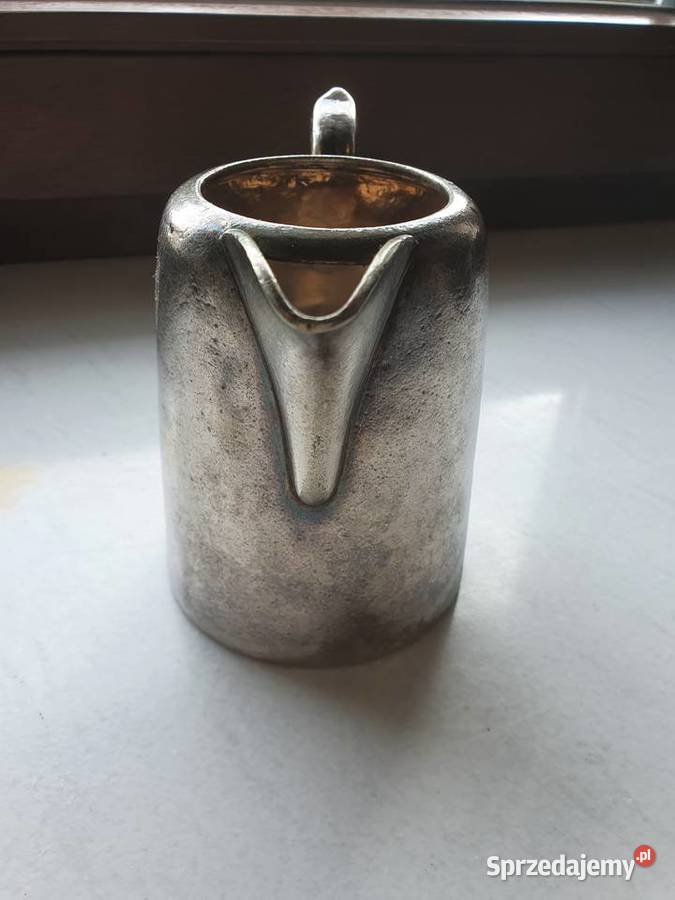 Stary ozdobny dzbanek z uchwytem z metalu w Antykwariat sprzedam