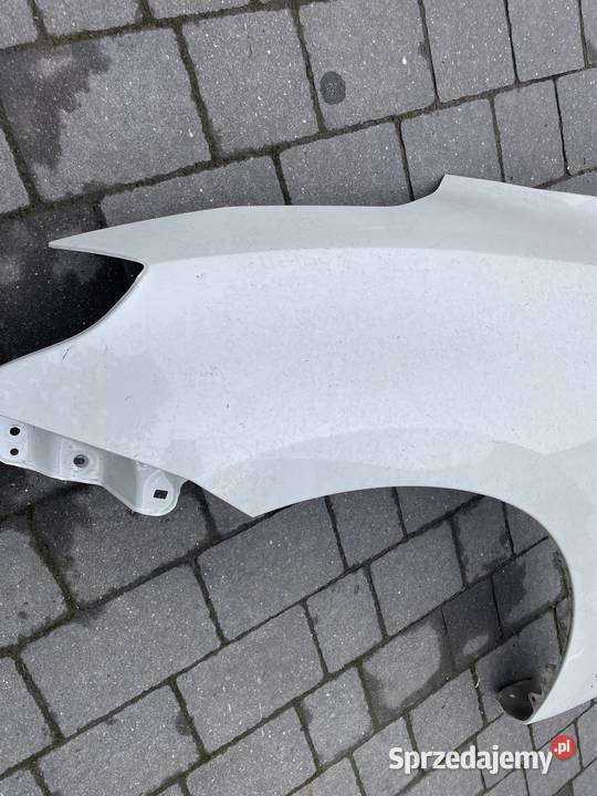 Suzuki Swift MK8 błotnik lewy przód Kozubszczyzna