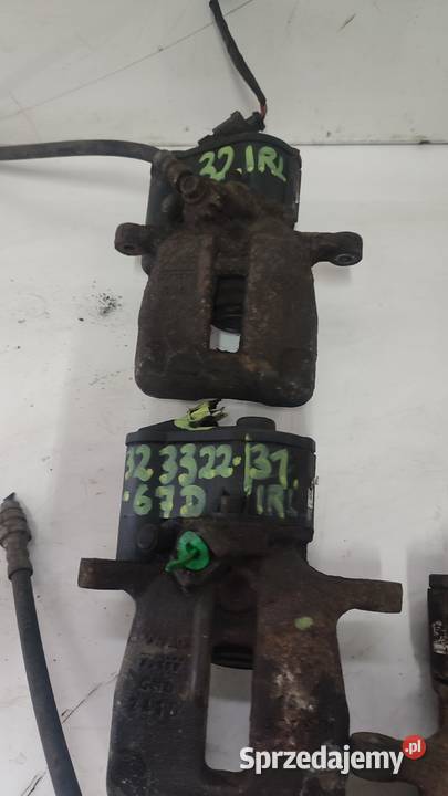 2933ZACISK ELEKTRYCZNY PASSAT B7 LEWY PRAWY TYŁ osobowe Włoszczowa
